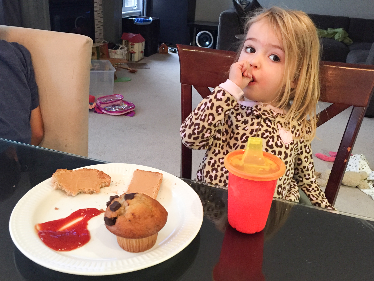 toddler eating breakfast